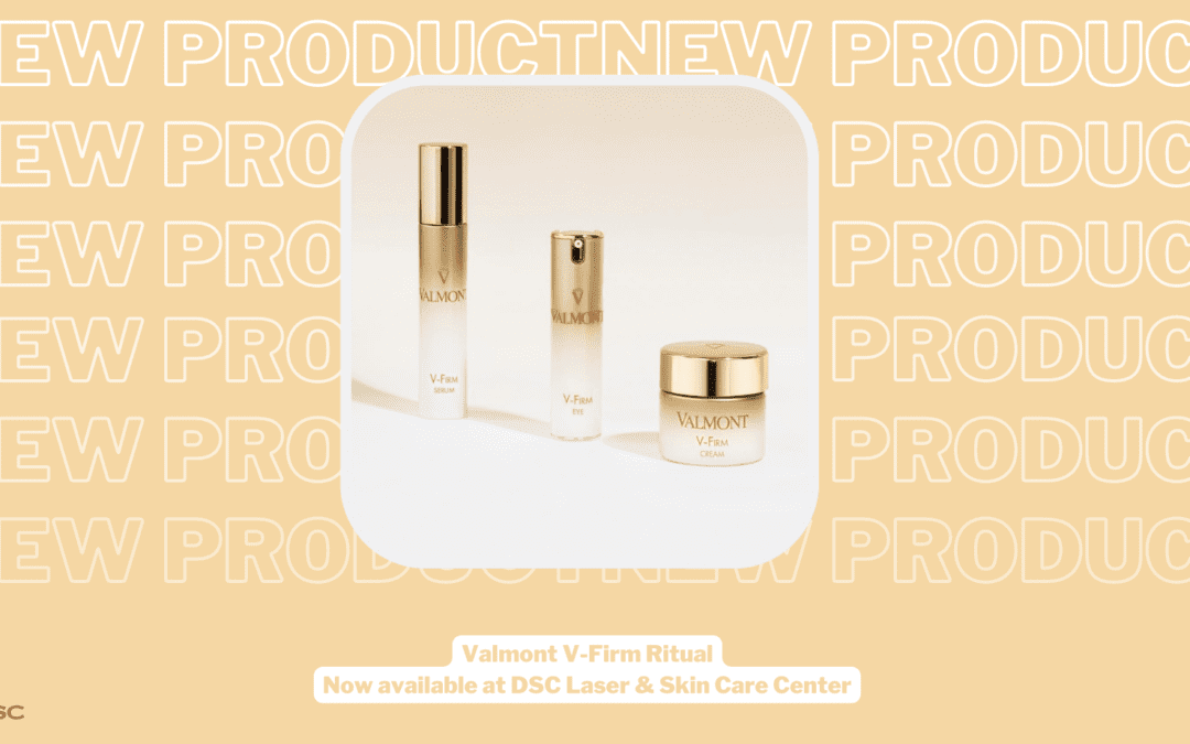 Valmont Cosmetics V-Firm Launch Blog Post Banner with yellow gold background and repeated "new product" text. Middle image features all three products in the Valmont V-Firm range with the serum, eye cream, and cream from left to right. Bottom of the graphic includes "Valmont V-Firm Ritual Now Available at DSC Laser & Skin Care Center" text