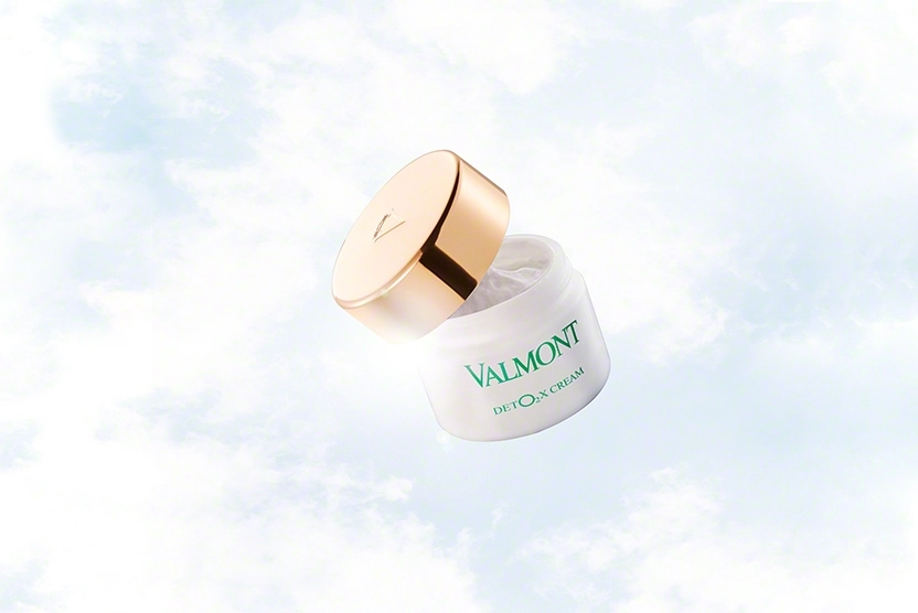 Valmont Deto2x Cream Product Over Cloud and Sky Background