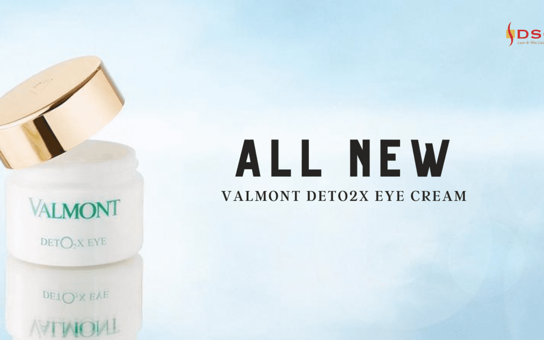Valmont Deto2x Eye Cream product with reflection on left side of image over blue background with the text "All New" and "Valmont Deto2x Eye Cream" to the right and DSC Laser & Skin Care Center logo at top right