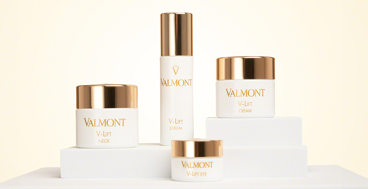 DSC Valmont Cosmetics V-Lift Products Image with V-Lift Neck, V-lift Eye, V-Lift Cream, and V-Lift Serum displayed in tiers from right, clockwise