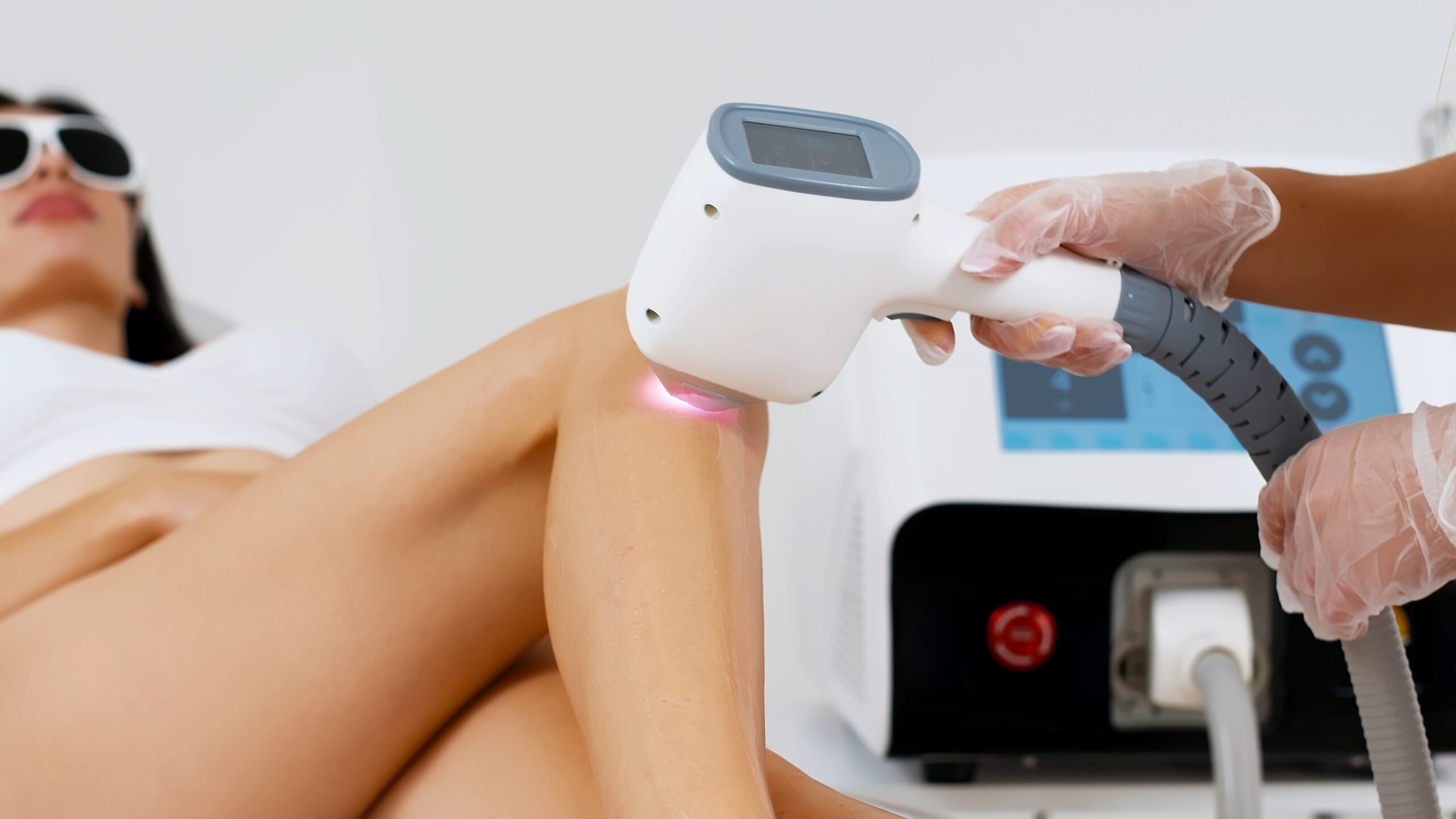 Satisfied young woman feeling relaxed after laser hair removal at spa