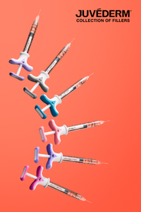 Juvederm collection of hyaluronic acid dermal fillers assorted syringes on orange background